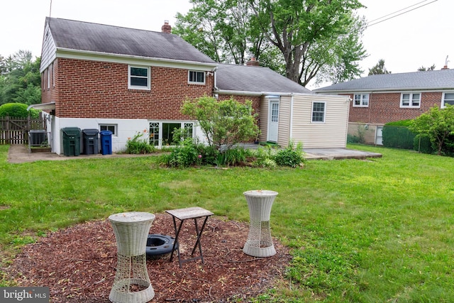 1545 Shoemaker Rd, Abington, PA 19001 - back of house with a chimney, brick siding, and a patio
