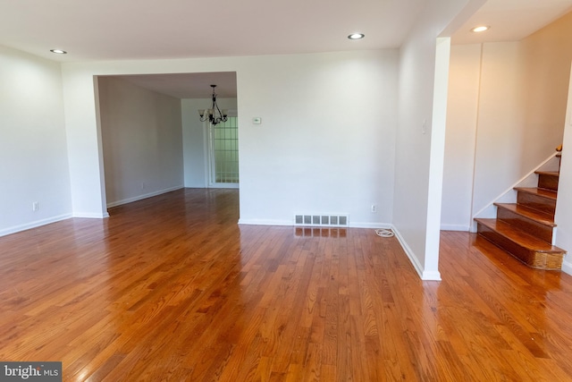 1545 Shoemaker Rd, Abington, PA 19001 - spare room with a chandelier, wood finished floors, stairs, and recessed lighting