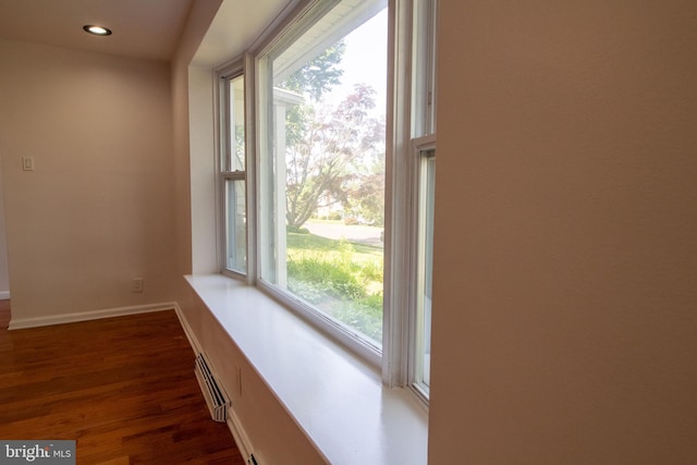 1545 Shoemaker Rd, Abington, PA 19001 - hallway with a baseboard heating unit, wood finished floors, and recessed lighting