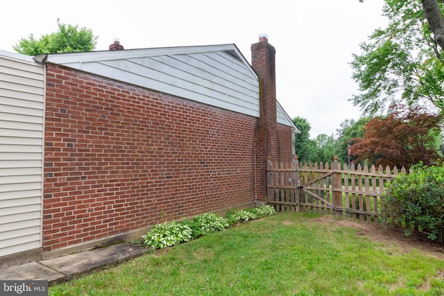 1545 Shoemaker Rd, Abington, PA 19001 - view of side of property featuring a chimney and brick siding