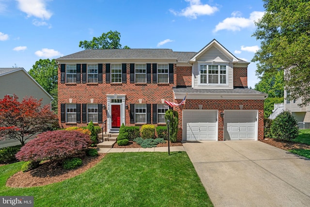 1412 Eagle Ridge Run, Bel Air, MD 21014 - view of front of house featuring driveway, a garage, brick siding, and a front yard