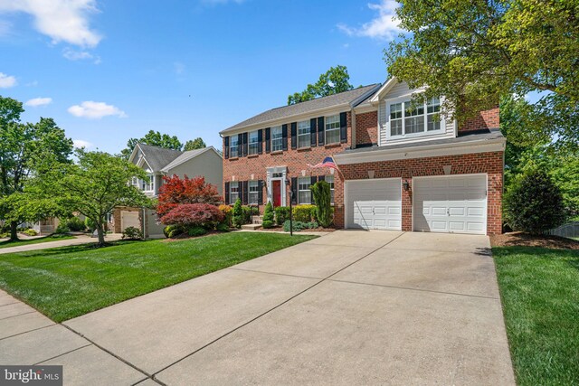 1412 Eagle Ridge Run, Bel Air, MD 21014 - view of front of home featuring a garage, concrete driveway, a front yard, and brick siding