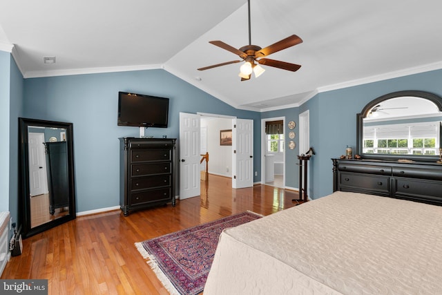 1412 Eagle Ridge Run, Bel Air, MD 21014 - bedroom with wood finished floors, multiple windows, ornamental molding, vaulted ceiling, and baseboards