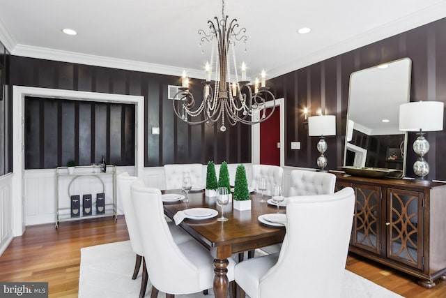 2 Autumn Meadow Ln, Malvern, PA 19355 - dining space with a decorative wall, ornamental molding, a chandelier, wood finished floors, and recessed lighting