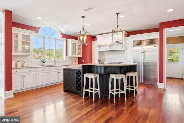 2 Autumn Meadow Ln, Malvern, PA 19355 - kitchen featuring stainless steel built in fridge, wood finished floors, a sink, healthy amount of natural light, and recessed lighting