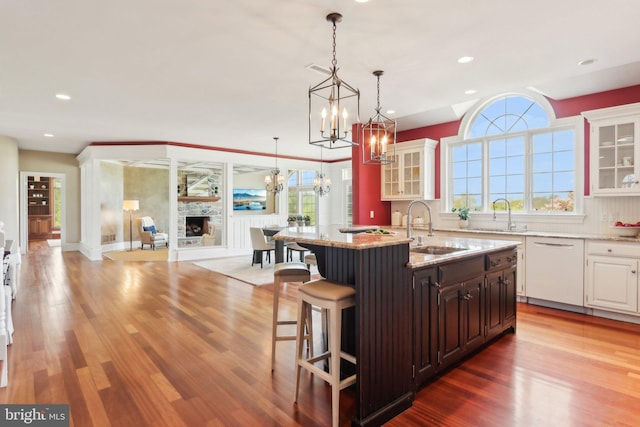 2 Autumn Meadow Ln, Malvern, PA 19355 - kitchen featuring a sink, a chandelier, wood finished floors, a kitchen breakfast bar, and recessed lighting