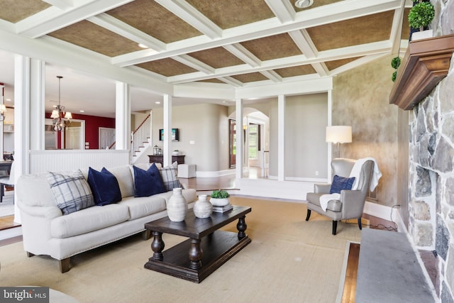 2 Autumn Meadow Ln, Malvern, PA 19355 - living room featuring coffered ceiling, stairs, arched walkways, and beam ceiling