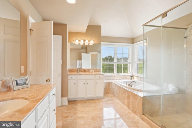 2 Autumn Meadow Ln, Malvern, PA 19355 - bathroom with two vanities, a bath, a stall shower, and vaulted ceiling