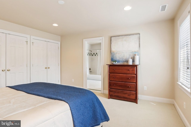 2 Autumn Meadow Ln, Malvern, PA 19355 - carpeted bedroom with multiple closets, recessed lighting, ensuite bathroom, multiple windows, and baseboards