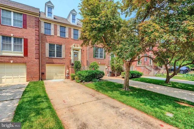 608 Budleigh Cir, Lutherville Timonium, MD 21093 - view of property with concrete driveway, brick siding, and a garage