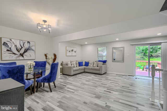 608 Budleigh Cir, Lutherville Timonium, MD 21093 - living room featuring light wood-style flooring, a chandelier, and recessed lighting