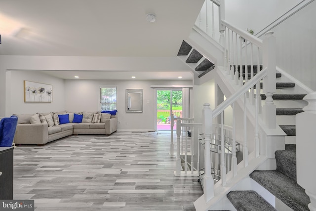 608 Budleigh Cir, Lutherville Timonium, MD 21093 - living room with light wood-style flooring, stairway, and recessed lighting