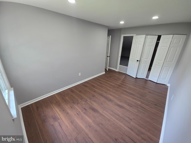 9456 Keepsake Way, Columbia, MD 21046 - unfurnished bedroom with dark wood-style floors and recessed lighting