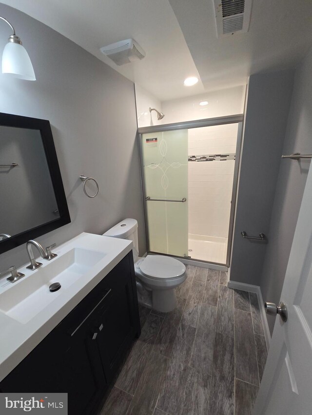 9456 Keepsake Way, Columbia, MD 21046 - full bath featuring a shower stall, vanity, wood finished floors, and recessed lighting