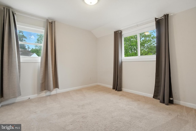 2816 Denley Pl, Silver Spring, MD 20906 - spare room with lofted ceiling, healthy amount of natural light, and carpet