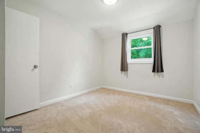 2816 Denley Pl, Silver Spring, MD 20906 - carpeted spare room featuring baseboards and vaulted ceiling