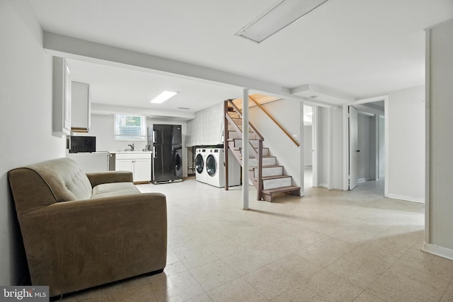 2816 Denley Pl, Silver Spring, MD 20906 - living room with washer and clothes dryer, light flooring, and stairway