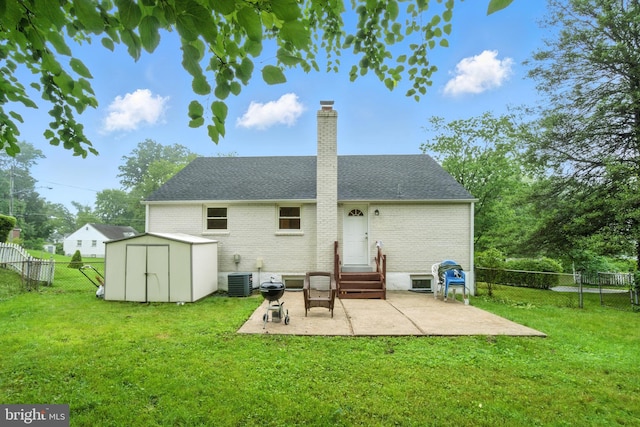 2816 Denley Pl, Silver Spring, MD 20906 - rear view of house with a patio area, brick siding, a fenced backyard, and a chimney