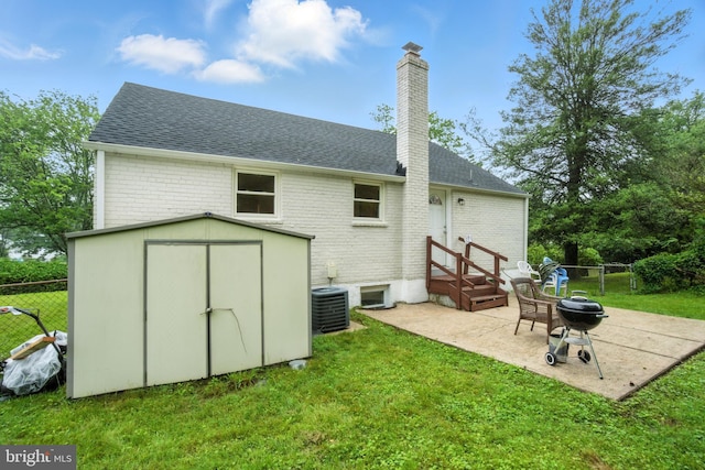 2816 Denley Pl, Silver Spring, MD 20906 - rear view of house with a chimney, roof with shingles, a patio area, and brick siding