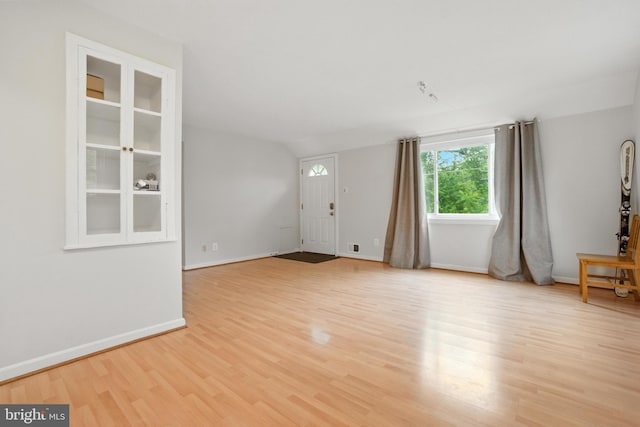 2816 Denley Pl, Silver Spring, MD 20906 - unfurnished room featuring light wood-style floors and lofted ceiling