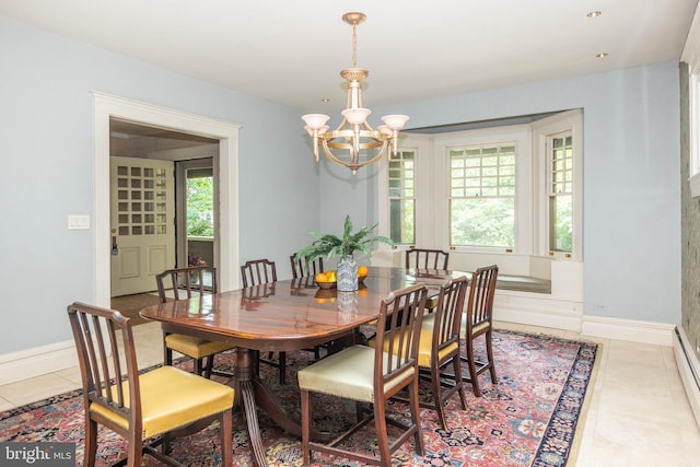 403 Club Rd, Baltimore, MD 21210 - tiled dining room with a chandelier and baseboards