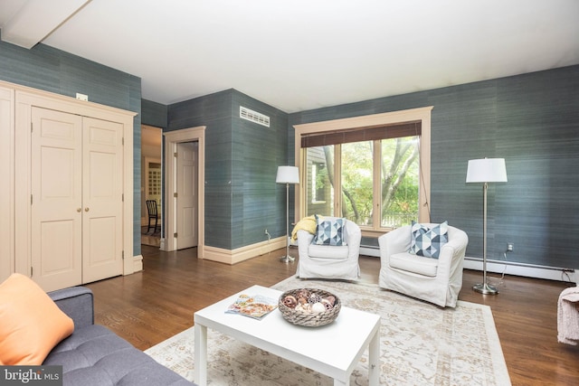 403 Club Rd, Baltimore, MD 21210 - living room with wallpapered walls, a baseboard radiator, wood finished floors, and baseboards
