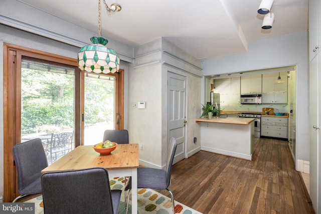 403 Club Rd, Baltimore, MD 21210 - dining room with dark wood finished floors and baseboards