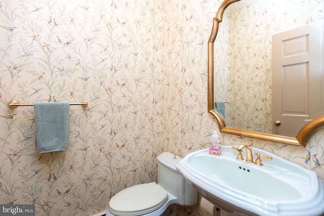 403 Club Rd, Baltimore, MD 21210 - bathroom featuring wallpapered walls, a sink, and toilet