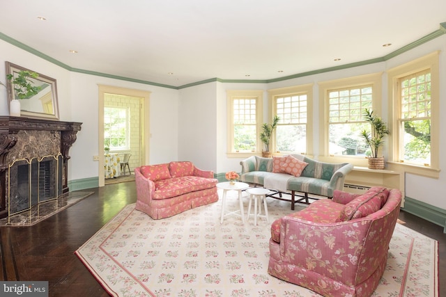 403 Club Rd, Baltimore, MD 21210 - living room featuring crown molding, baseboards, a fireplace, and wood finished floors