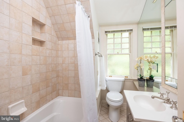 403 Club Rd, Baltimore, MD 21210 - full bathroom featuring shower / bath combo, toilet, tile patterned flooring, vanity, and plenty of natural light