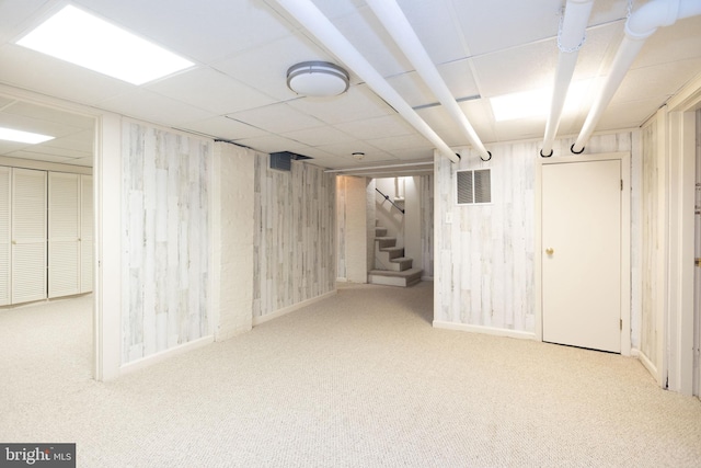 403 Club Rd, Baltimore, MD 21210 - finished basement featuring stairway, carpet flooring, wood walls, and a drop ceiling