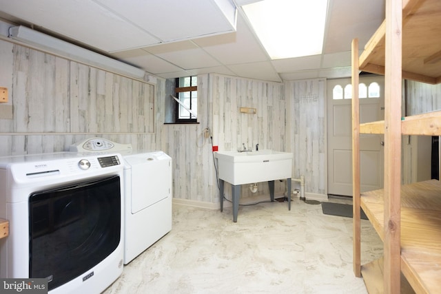 403 Club Rd, Baltimore, MD 21210 - washroom with washer and clothes dryer and baseboards