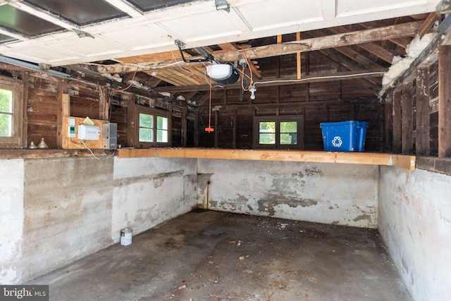 403 Club Rd, Baltimore, MD 21210 - garage featuring a garage door opener and electric panel