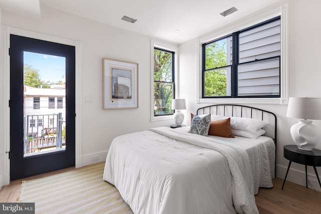 441 Q St NW Unit 2, Washington, DC 20001 - bedroom featuring light wood-style floors and access to exterior