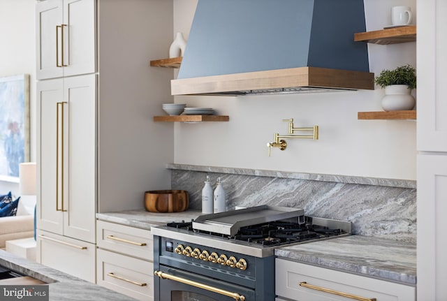 441 Q St NW Unit 2, Washington, DC 20001 - kitchen featuring open shelves, premium range hood, gas range oven, white cabinetry, and backsplash