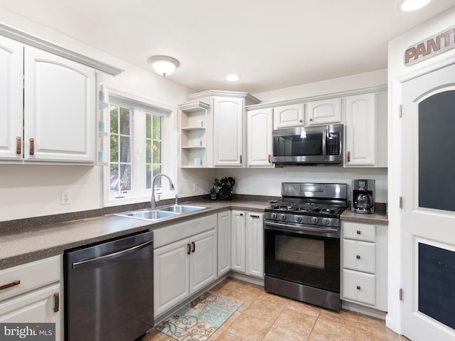5185 Turkey Point Road, North East, MD 21901 - kitchen with appliances with stainless steel finishes, dark countertops, white cabinets, and recessed lighting