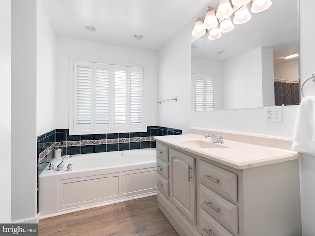 5185 Turkey Point Road, North East, MD 21901 - full bathroom featuring vanity, a garden tub, and wood finished floors