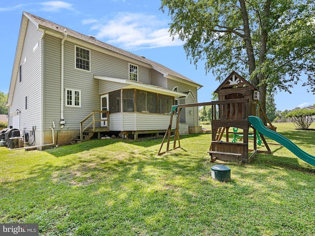 5185 Turkey Point Road, North East, MD 21901 - back of house with a sunroom, a playground, and a yard