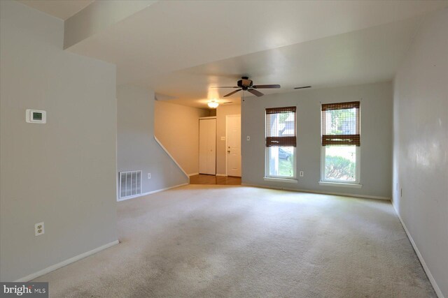 6483 Heatherfield Way, Harrisburg, PA 17112 - unfurnished living room featuring a ceiling fan, carpet flooring, and baseboards