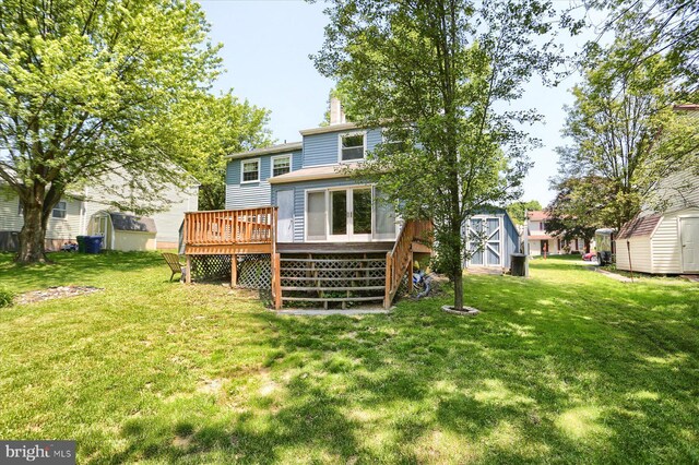 6483 Heatherfield Way, Harrisburg, PA 17112 - back of house with a deck, a yard, and a chimney