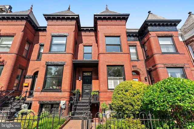 111 8th St SE, Washington, DC 20003 - multi unit property with brick siding and a fenced front yard