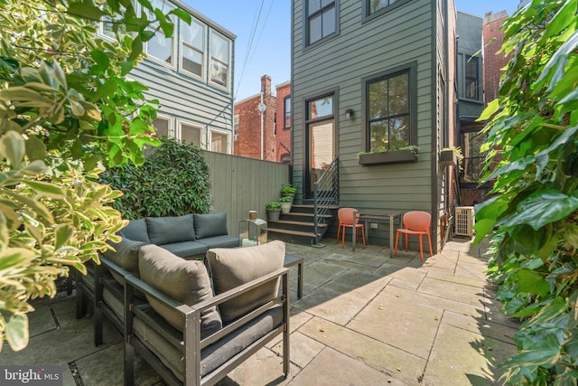 111 8th St SE, Washington, DC 20003 - view of patio / terrace with outdoor lounge area, entry steps, and central AC