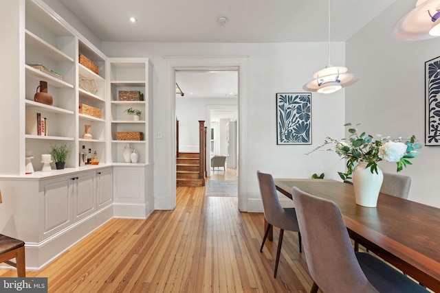 111 8th St SE, Washington, DC 20003 - dining area with light wood finished floors, baseboards, recessed lighting, and stairway