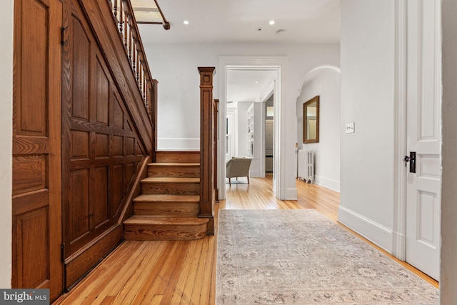 111 8th St SE, Washington, DC 20003 - foyer entrance with radiator, stairs, light wood-style floors, baseboards, and recessed lighting