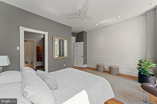 111 8th St SE, Washington, DC 20003 - bedroom featuring wood finished floors, recessed lighting, baseboards, a ceiling fan, and connected bathroom