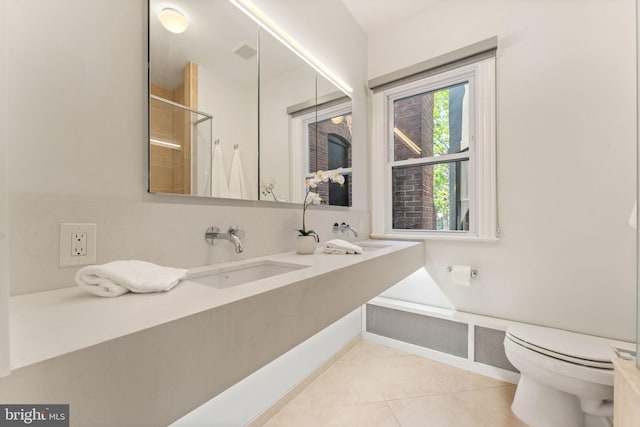 111 8th St SE, Washington, DC 20003 - full bath with toilet, tile patterned floors, double vanity, and a shower with door
