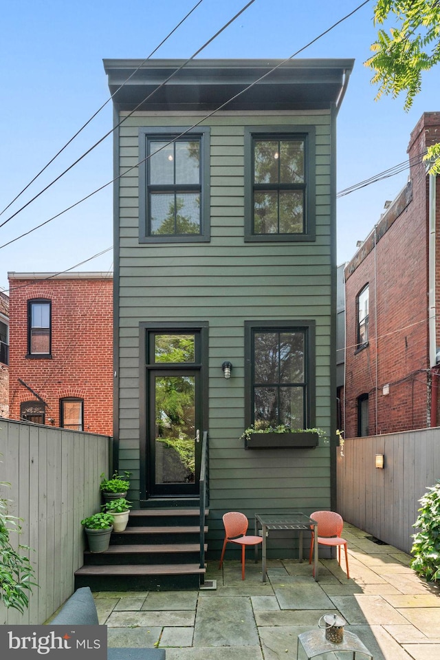 111 8th St SE, Washington, DC 20003 - back of house with entry steps and a patio area