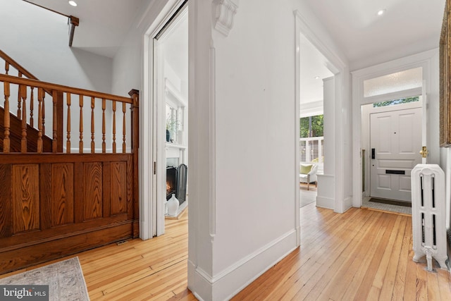 111 8th St SE, Washington, DC 20003 - foyer featuring hardwood / wood-style flooring, radiator heating unit, baseboards, stairway, and recessed lighting