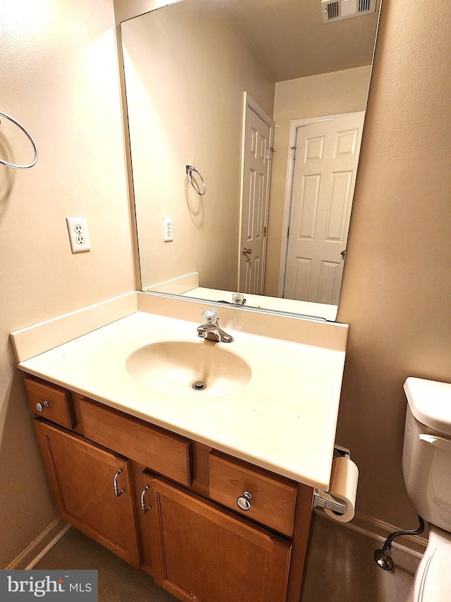 10361 Bridle Ct, Hagerstown, MD 21740 - half bath featuring vanity, toilet, and baseboards