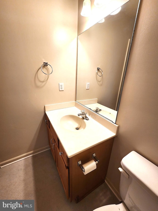 10361 Bridle Ct, Hagerstown, MD 21740 - half bathroom with toilet, vanity, and baseboards